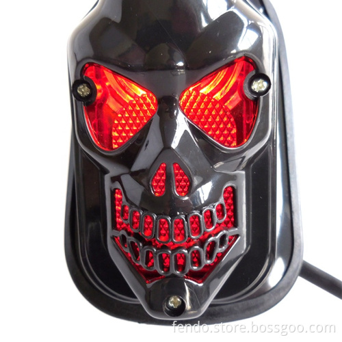 Red LED Skull Head Shaped Motorcycle DRL License Plate Lamp with Stop Brake Lights